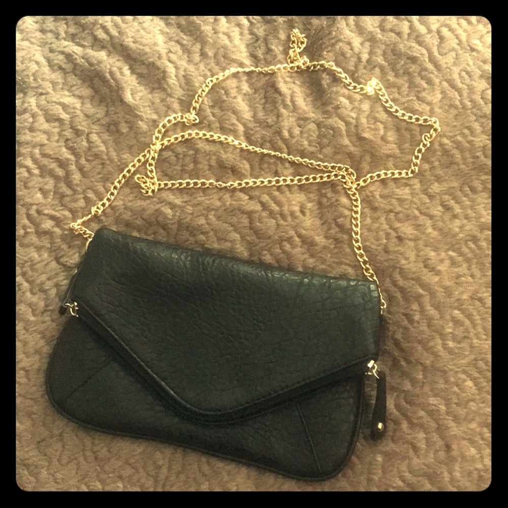 Black clutch with gold chain